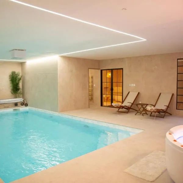 Bonica Spa, Exceptionnel, piscine intérieure, spa, sauna et Parking privé，位于Sallaumines的酒店