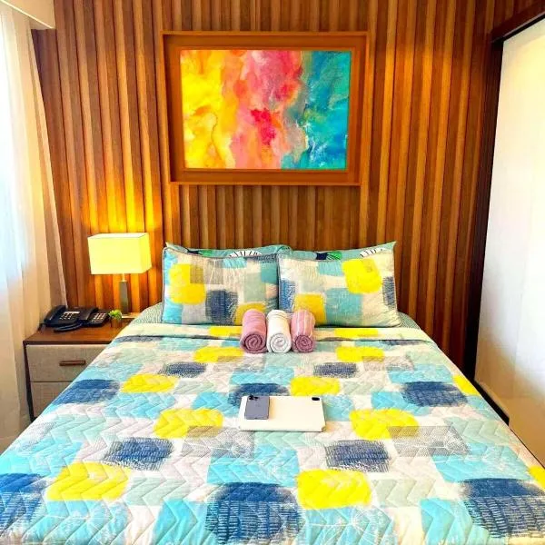 Kate & Keith's Place - Tambuli Seaside Living，位于Lapu Lapu City的酒店