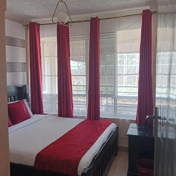 Cozy 1BR Apartment along Eldoret-Kisumu road close to Eldoret Polytechnic and Elgon View Hospital，位于埃尔多雷特的酒店