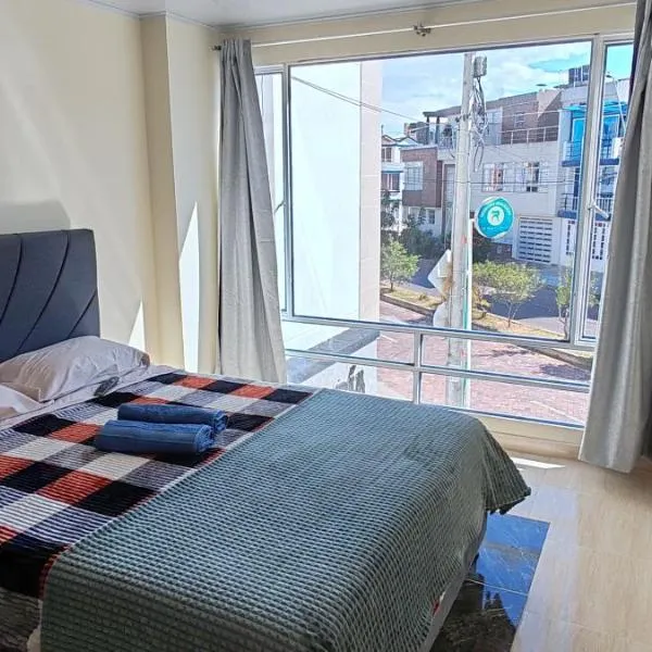 apartamento cerca CC Viva, Unicentro, UPTC Tunja，位于通哈的酒店
