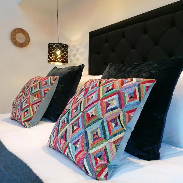 1 bedroom suite in Holt with parking，位于霍尔特的酒店