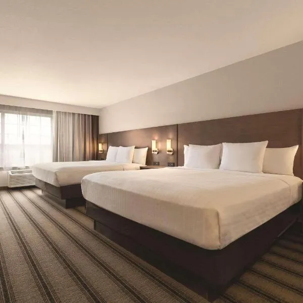 比林斯乡村套房江山旅馆，位于比林斯的酒店