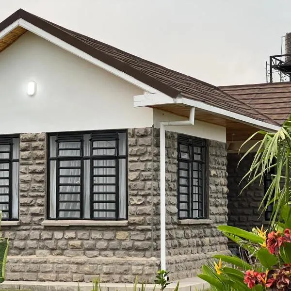 Kameso Farm guest house，位于Muhoroni的酒店