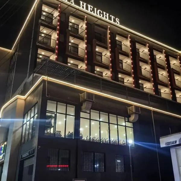 Ucha Hotel & Suites，位于坎帕拉的酒店