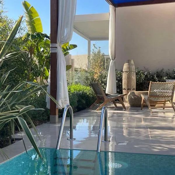 Green Coast beach villa with pool, hot tub & sauna，位于帕拉瑟的酒店