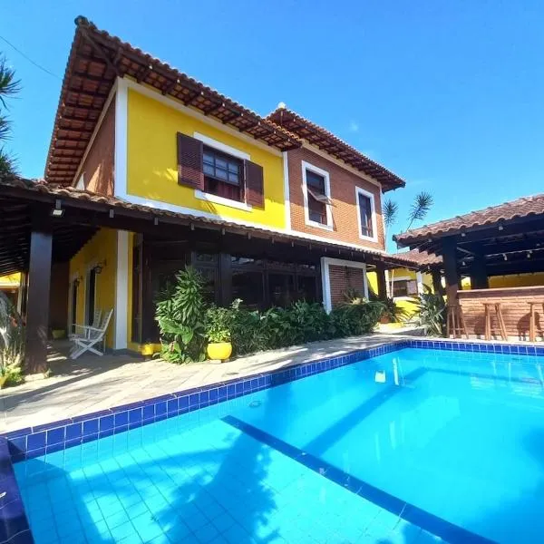Linda Casa de Alto Padrão 500mts Praia Enseada，位于瓜鲁雅的酒店