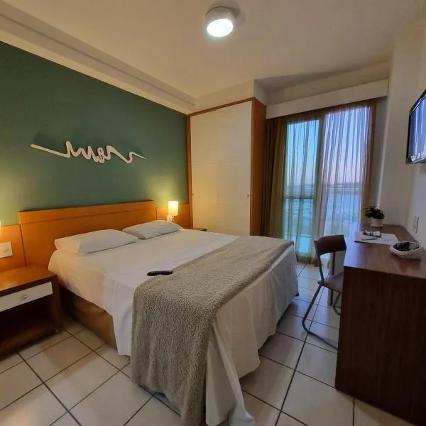 Espaço charmoso na ilha de Vitória Praia do Canto，位于维多利亚的酒店