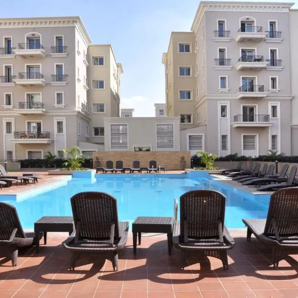 Axxodia- Apartments In Mivida Lake District，位于New cairo的酒店