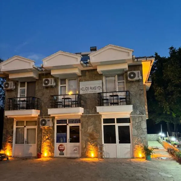 Gökçeada Helios Pansiyon，位于格克切达镇的酒店
