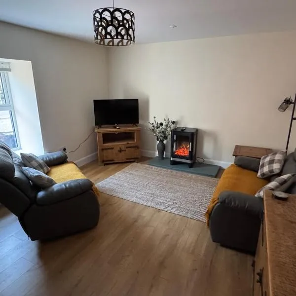 New cosy ground floor flat，位于霍伊克的酒店
