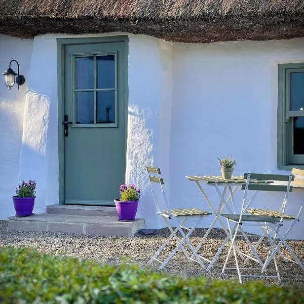 Murphys Thatched Cottage，位于米切尔斯敦的酒店