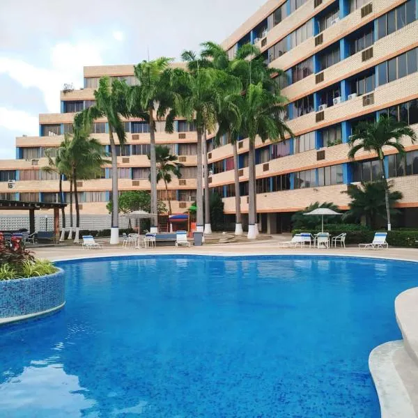 Apartamento Punta Brava con Piscina y Ubicación Central，位于Tucacas的酒店