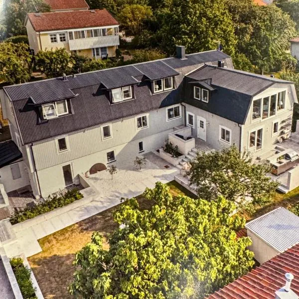 Havsutsikt & Solnedgång i två plan på 100kvm för 6p，位于维斯比的酒店