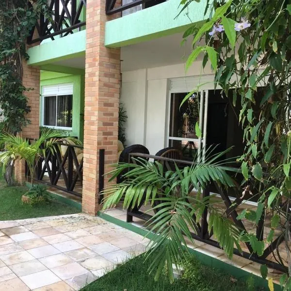 Condomínio Arituba Tropical - Praia Camurupim - Apartamento a 150m da praia，位于尼西亚弗洛雷斯塔的酒店