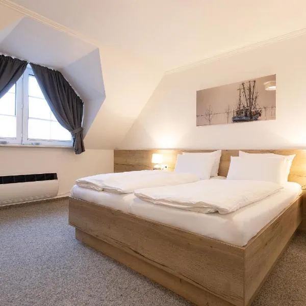 Cuxlandhotel Doppelzimmer 120，位于多鲁姆纽菲尔德的酒店