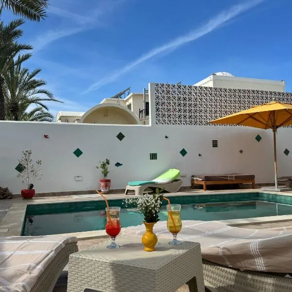 Maison d'hôtes Dar El Kahina Djerba，位于迈来亚的酒店