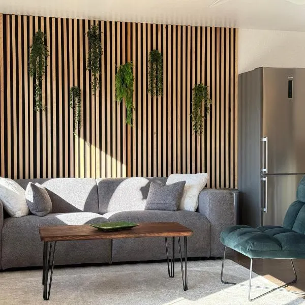 Appartement spacieux avec garage individuel et terrasse，位于希尔蒂盖姆的酒店