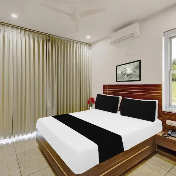 Super Townhouse Oak Dharwad formerly Rising Resort & Spa，位于Mugad的酒店