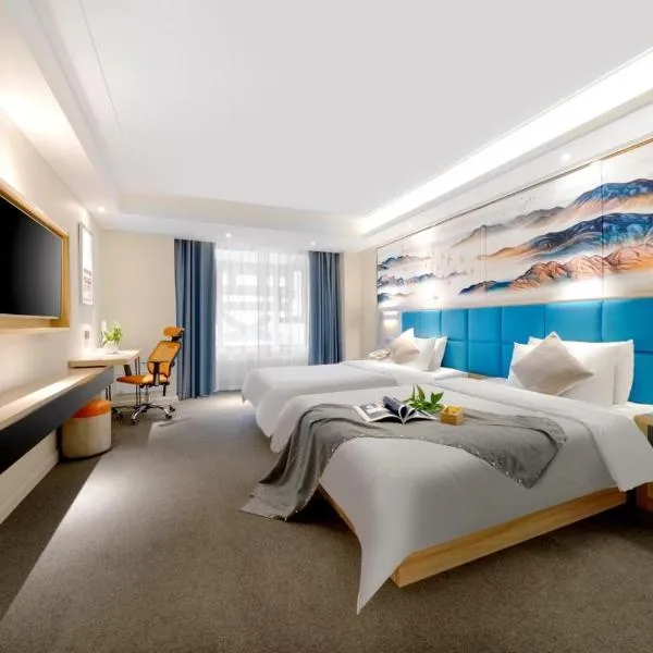 Happy Manju Hotel--Harbin Haxi High-speed Railway West Station Wanda Plaza Branch，位于哈尔滨的酒店