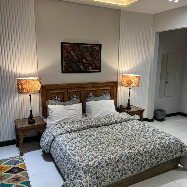 Lyallpur Home Stay，位于费萨拉巴德的酒店