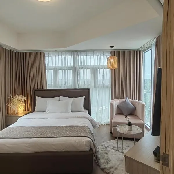 S&R Staycation Davao - Spacious 1Bedroom & Fully Equipped Unit Beside Abreeza Mall，位于达沃市的酒店
