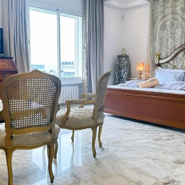 L'Orchidée - Suites de Luxe avec Piscine Chauffée et Vue sur le Lac de Tunis，位于突尼斯的酒店