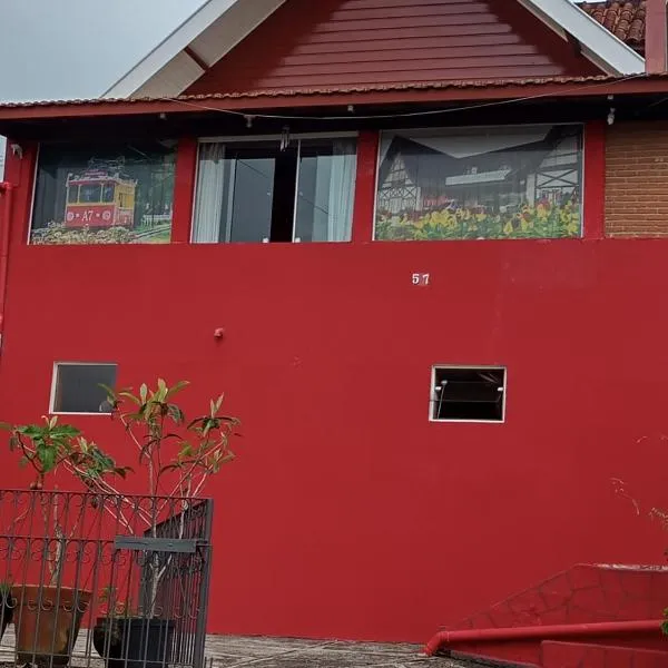 Parque das cerejeiras-acomodações básicas para até 3 pessoas-frente，位于坎波斯杜若尔当的酒店