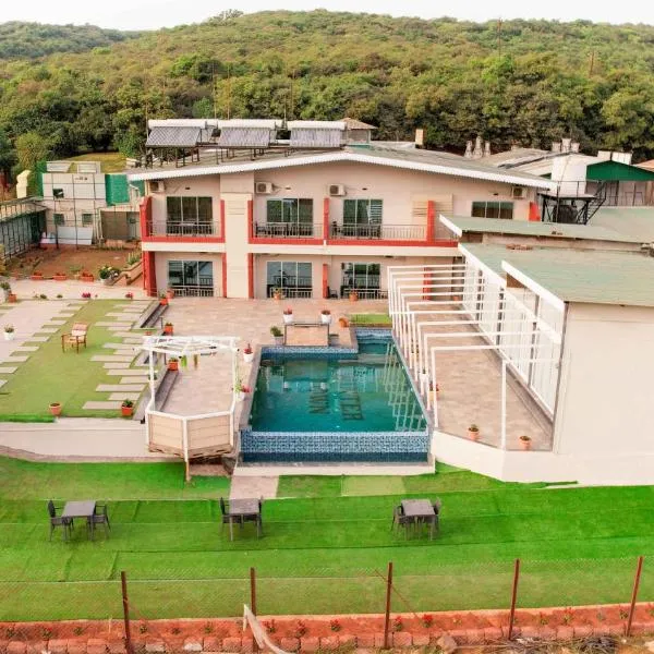 Treebo Winter Town Venna Lake with Swimming Pool，位于马哈巴莱斯赫瓦尔的酒店