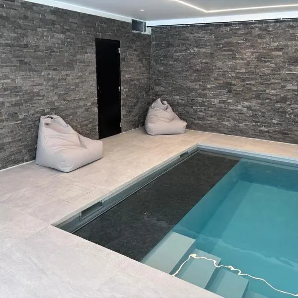 Le loft avec jacuzzi privatif - Domaine aux charmes d'Ethan，位于Hannut的酒店