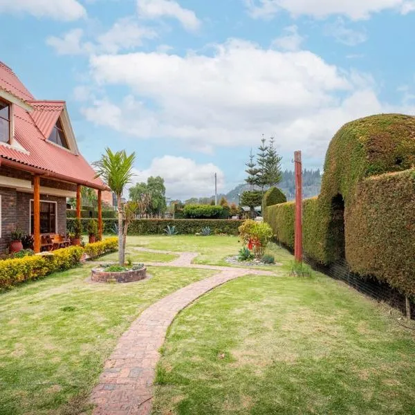 Country house with fireplace and mountain view，位于Ubaté的酒店