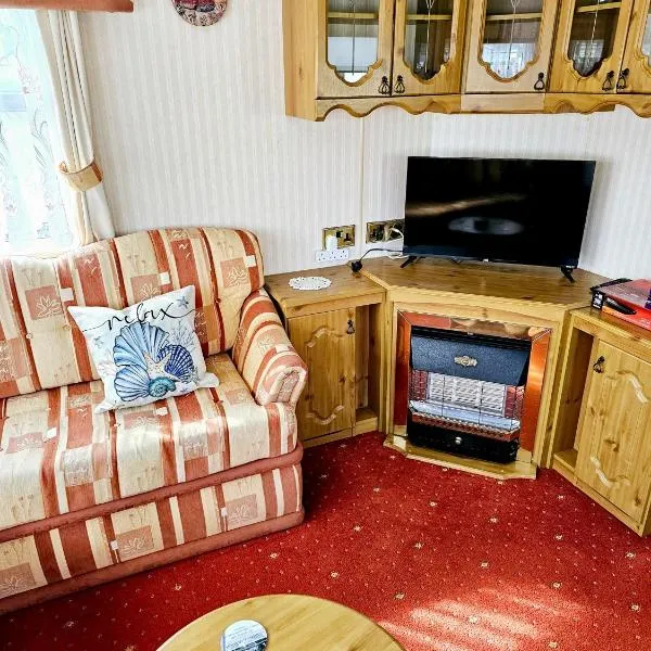 Sunrise Cottage central heated Southview Parkdean Skegness，位于Winthorpe的酒店