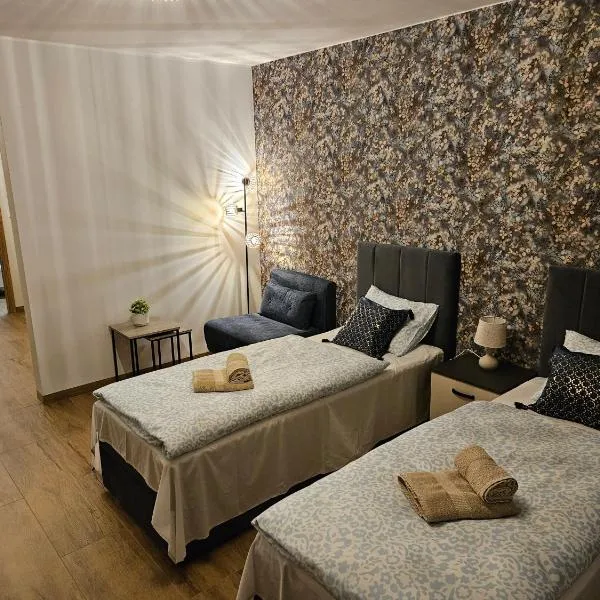 Virgo Apartments & Rooms Koleczkowo，位于Koleczkowo的酒店