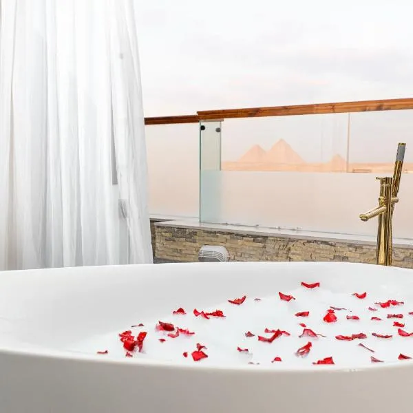 Sultan Pyramids Boutique Hotel View，位于埃兹贝特的酒店