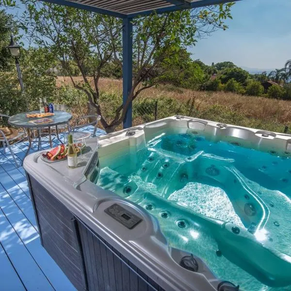 נופש מרום - 4 בקתות כפריות עם בריכה מחוממת מקורה, ג'קוזי וסאונה，位于玛尔盖姆拉的酒店