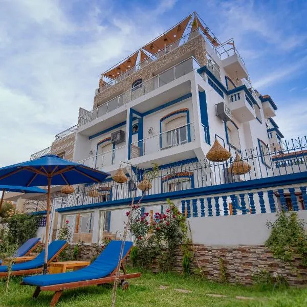 BLUE WAVE LODGE，位于伊米乌阿达尔的酒店