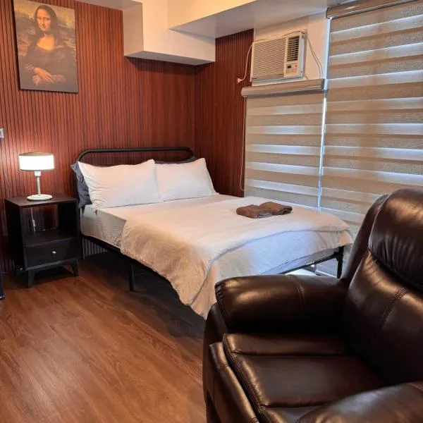 Condo in Mckinley Hill Taguig，位于马尼拉的酒店