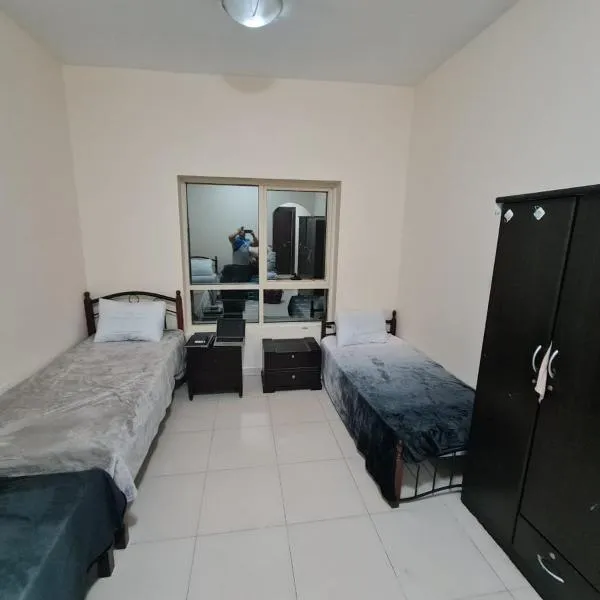 سكن شباب بالتعاون - ALEX Hostel - Sharjah，位于沙迦的酒店