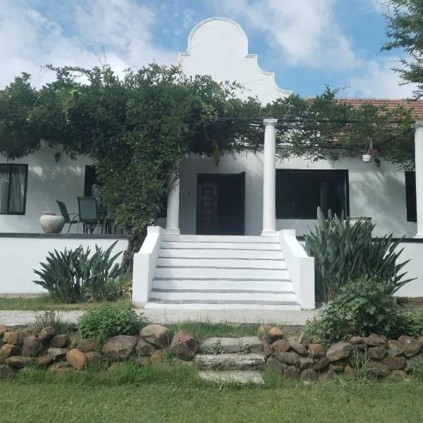 The Riverhouse Guesthouse，位于埃斯特科特的酒店
