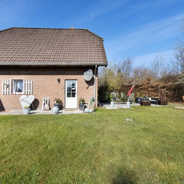 Ferienhaus Harmonie，位于Südbrookmerland的酒店