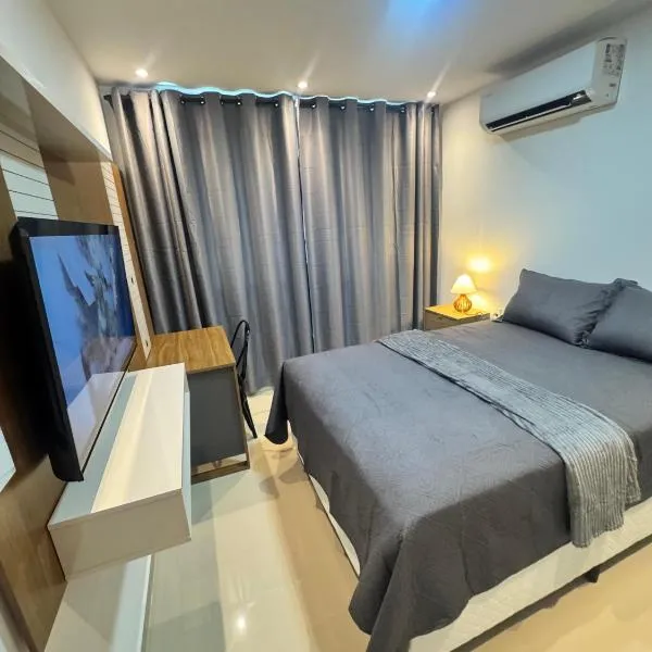 AP completo próx ao Shopping com piscina, garagem e ar，位于索布拉尔的酒店