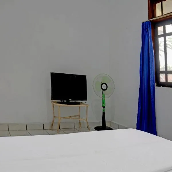 SPOT ON 92856 Home Stay Syariah Aom Kusman，位于苏加武眉的酒店