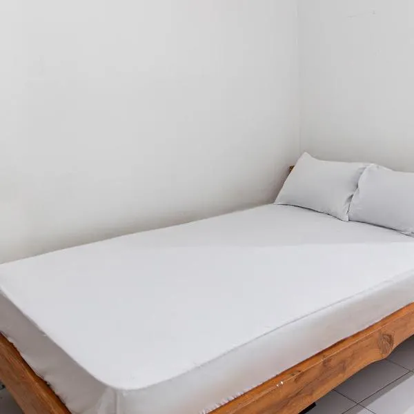 OYO Life 93504 Kost Krisna，位于Temukus的酒店