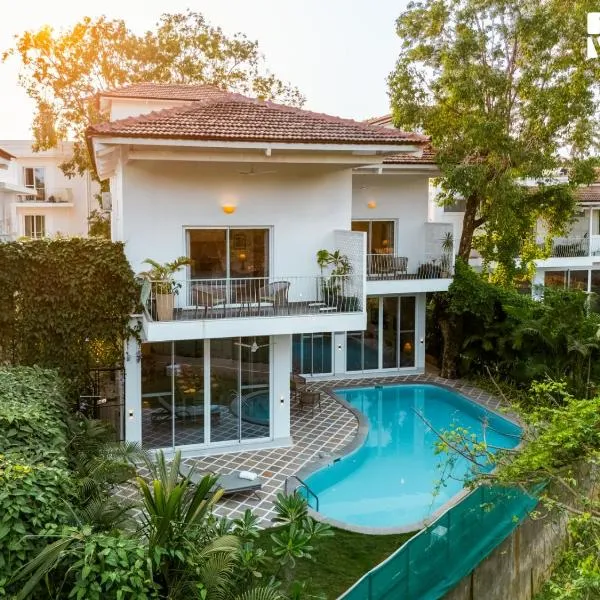 StayVista at Aroha Palms Paradiso - Pool, Wi-Fi，位于曼德姆的酒店