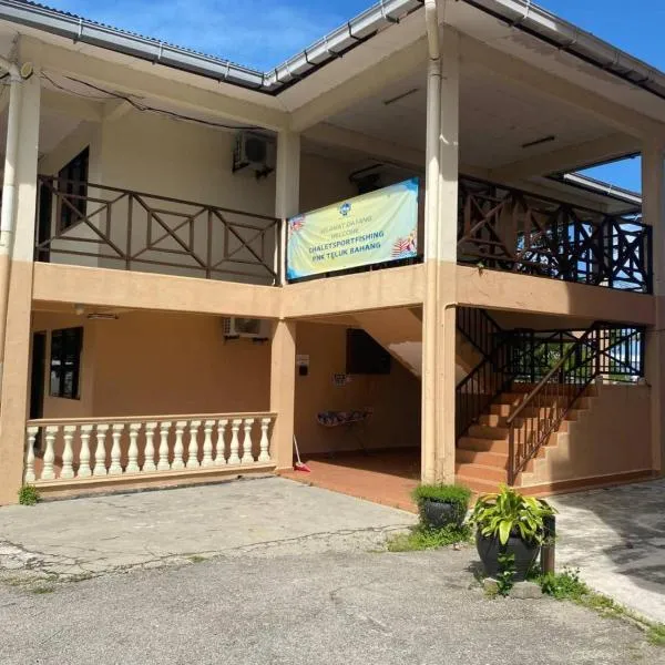 Capital O 91094 Hotel & Chalet Sportfishing，位于峇都丁宜的酒店