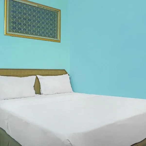 Collection O 92690 Hotel Limas，位于巨港的酒店