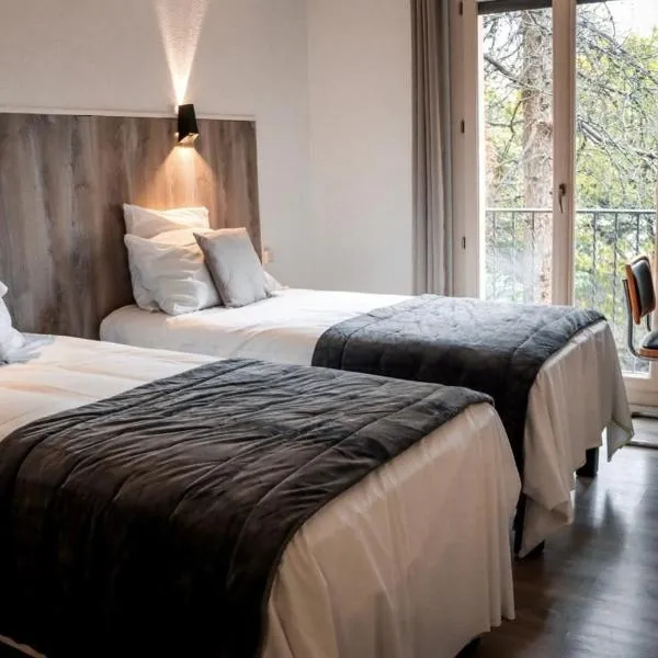 Logis Hotel Les Glycines，位于泰克河畔阿尔莱的酒店