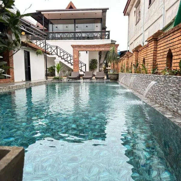 Win Hotel，位于万荣的酒店