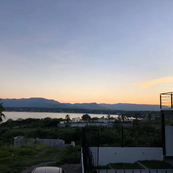 Hermosa casa vista al lago，位于特克塞丁戈的酒店