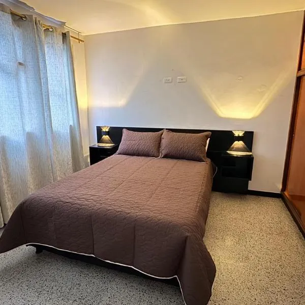 Apartamentos FM Calle 4，位于Líbano的酒店