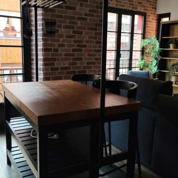 Apartamentos Parchis 1，位于希洪的酒店